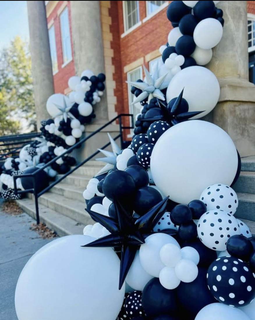 Black and white balloon installation