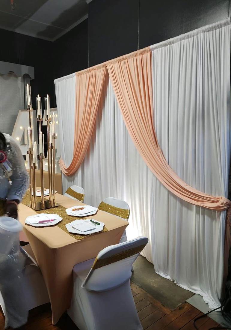 Peach and white draped backdrop